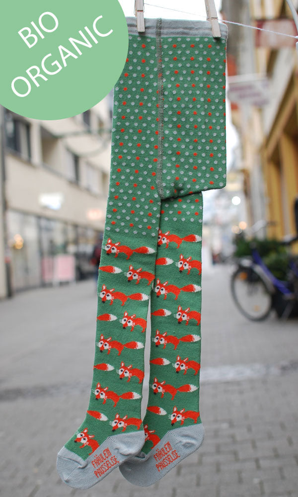 Kinder Srumpfhose mit Füchsen allover, der Bauchbereich der Strumpfhose hat farblich abgestimmte Punkte.