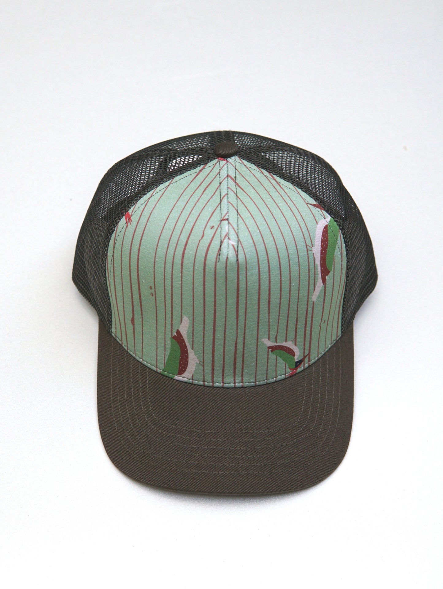 Cap mit Prusselise Spechtmuster in der Farbe oliv, sehr bequem und schoen anzusehen.