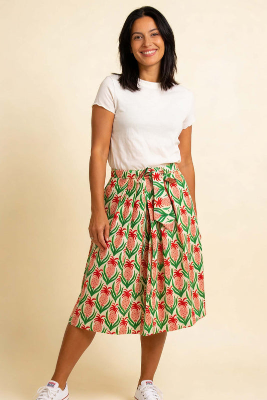 Wadenlanger, ausgestellter Rock mit glatter Taille und Rockteil in Falten gelegt, Tapetenmuster allover mit Annanas, sommerlich frisch.