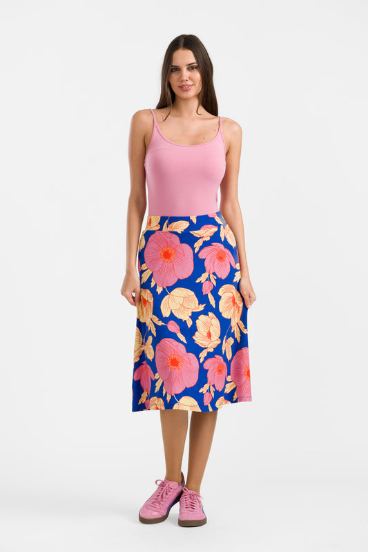 Fliessender Rock mit Elastikbund und wunderschönem, großzügigem Blumenmuster in hellgelb, pink, rot und blau.