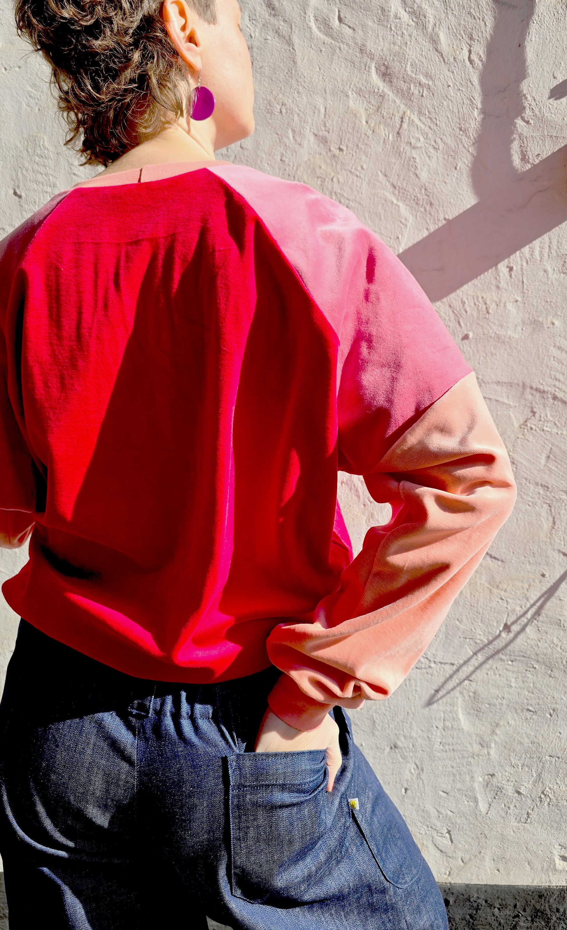 Sweatshirt mit Raglan Ärmel aus Bio Nicky in den tollsten Rot Tönen, pink und Lachs.