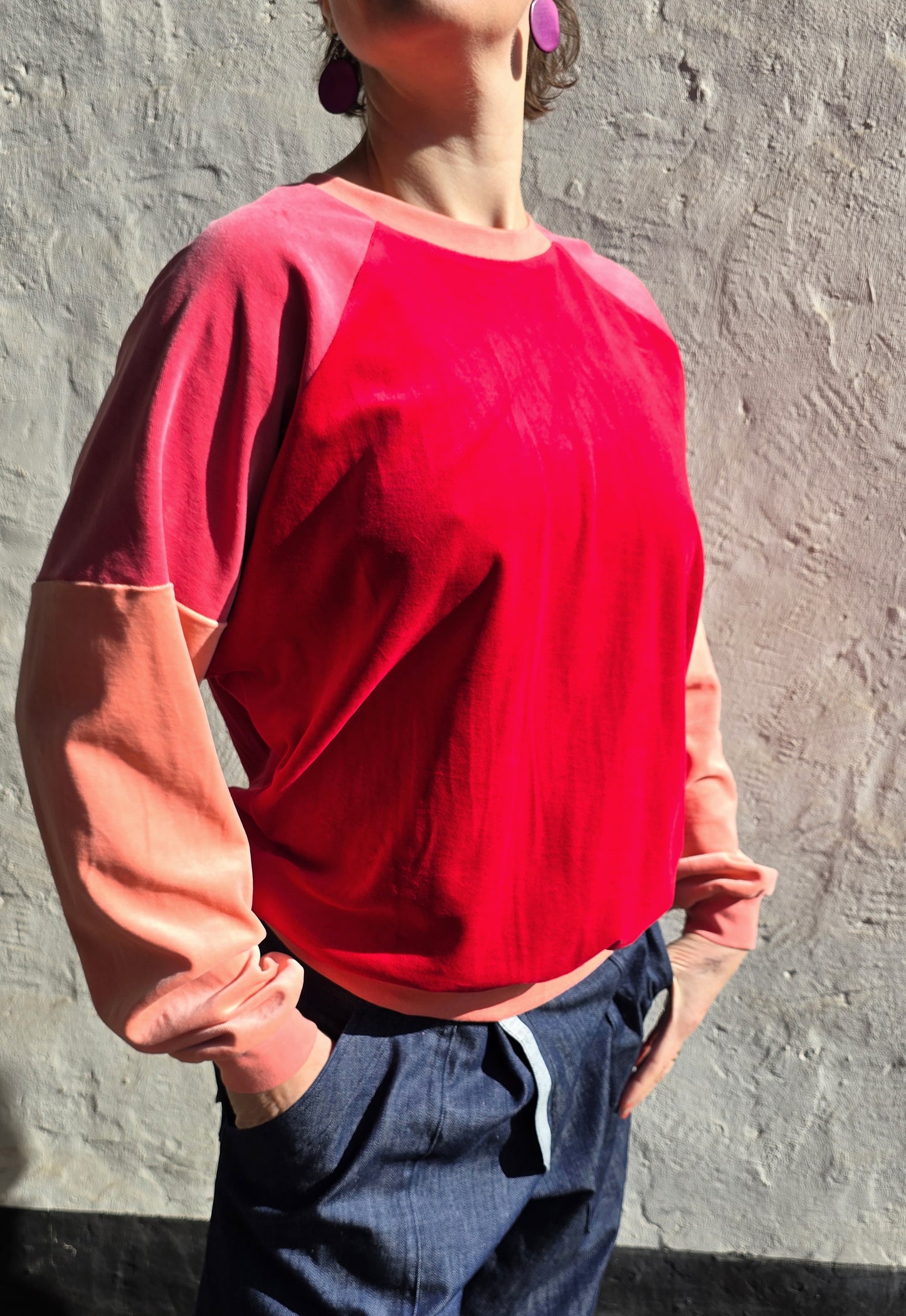 Sweatshirt mit Raglan Ärmel aus Bio Nicky in den tollsten Rot Tönen, pink und Lachs.