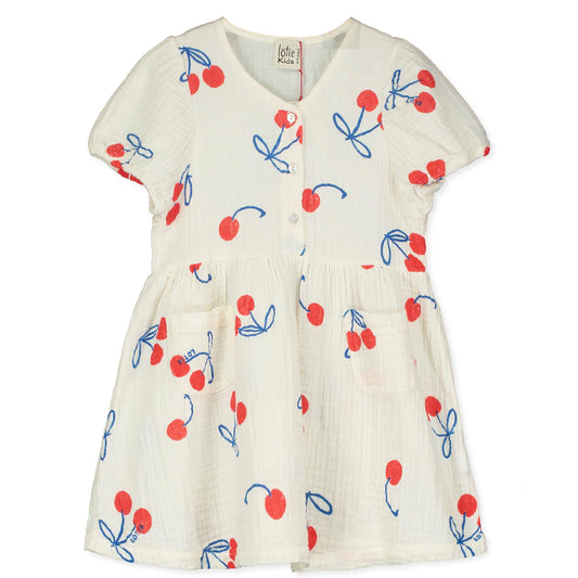 Kinderkleid in naturweiss Musselin mit aufgedruckten Kirschen, angekräuseltem Rockteil und kleinen Knöpfchen im Brustbereich, kurzer Ärmel. 