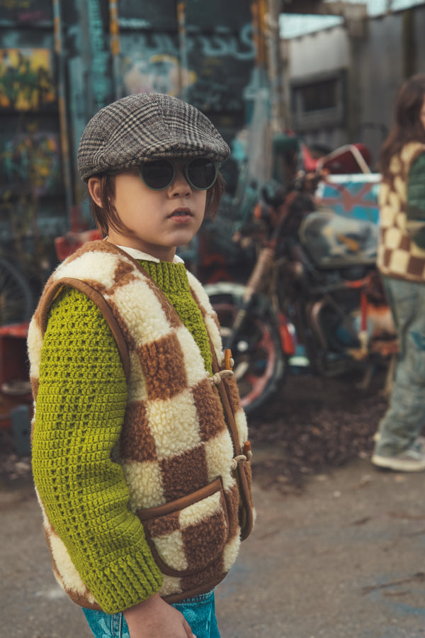 Weste aus weicher Wolle mit Karodruck im Teddyfleece in beige und braun.