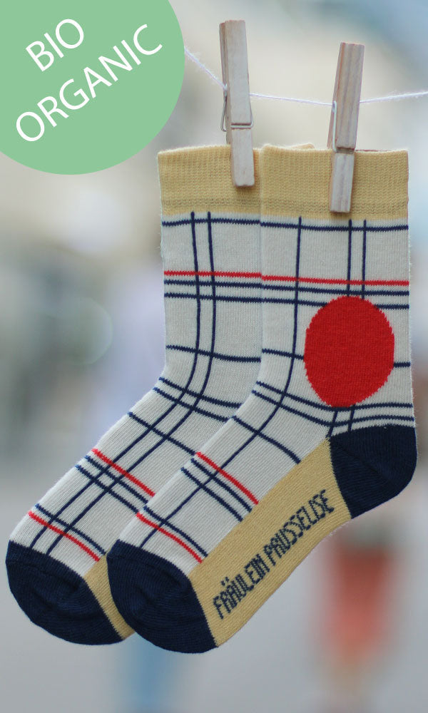 Prusselise Kindersocken mit coolem Gridmuster in gelb,blau und rot.