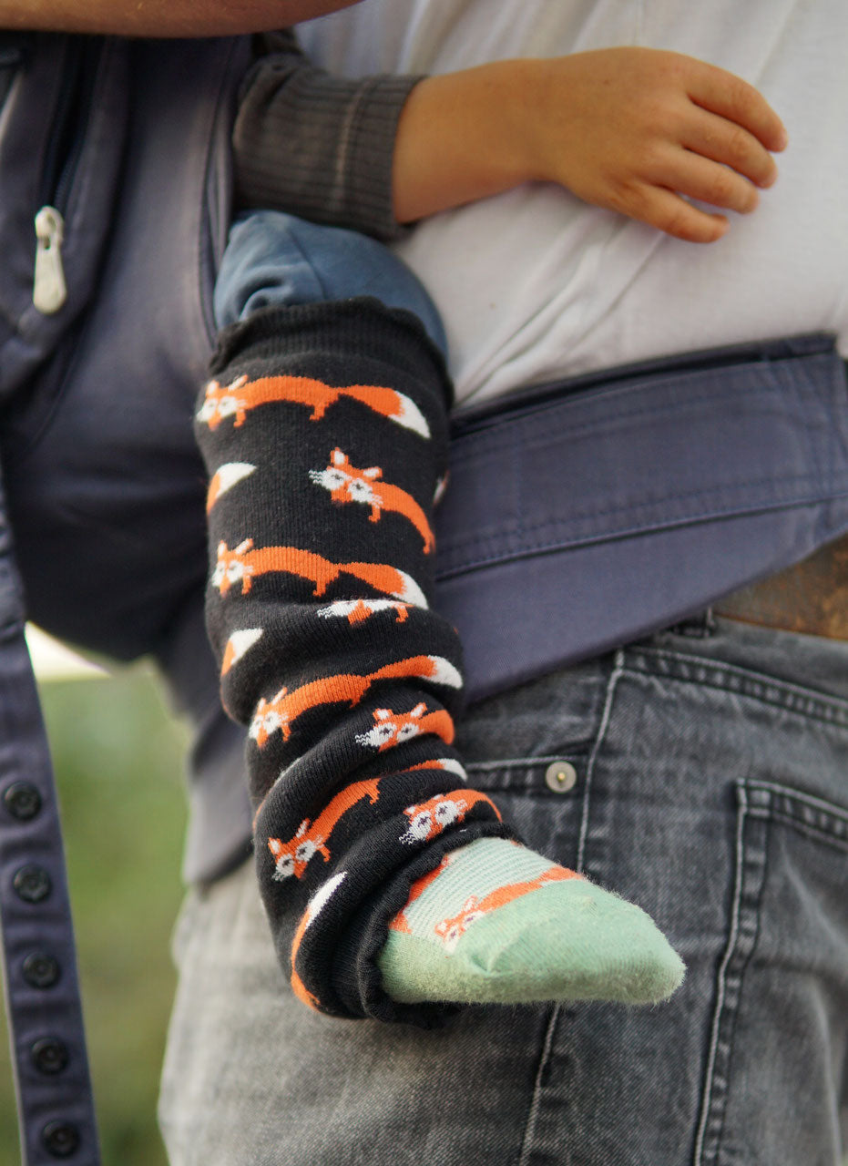 Einzigartige Frottee Stulpen mit Füchsen in  schwarz.